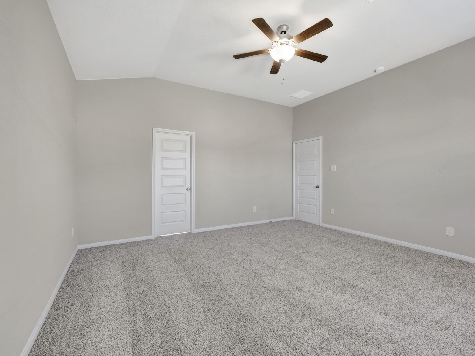 17882 Stone Terrace Montgomery, TX 77316 - Photo 10 of 33 an empty room with closet and a ceiling fan