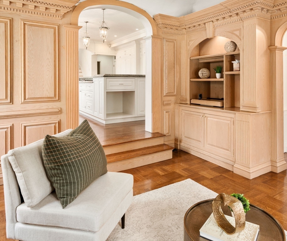 96 Monadnock Road Newton, MA 02467 - Photo 12 of 25 a living room with furniture and a fireplace