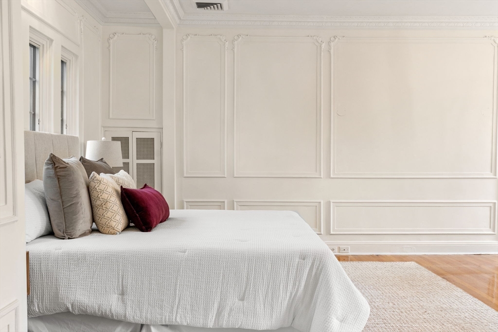 96 Monadnock Road Newton, MA 02467 - Photo 14 of 25 a bedroom with a bed and a window