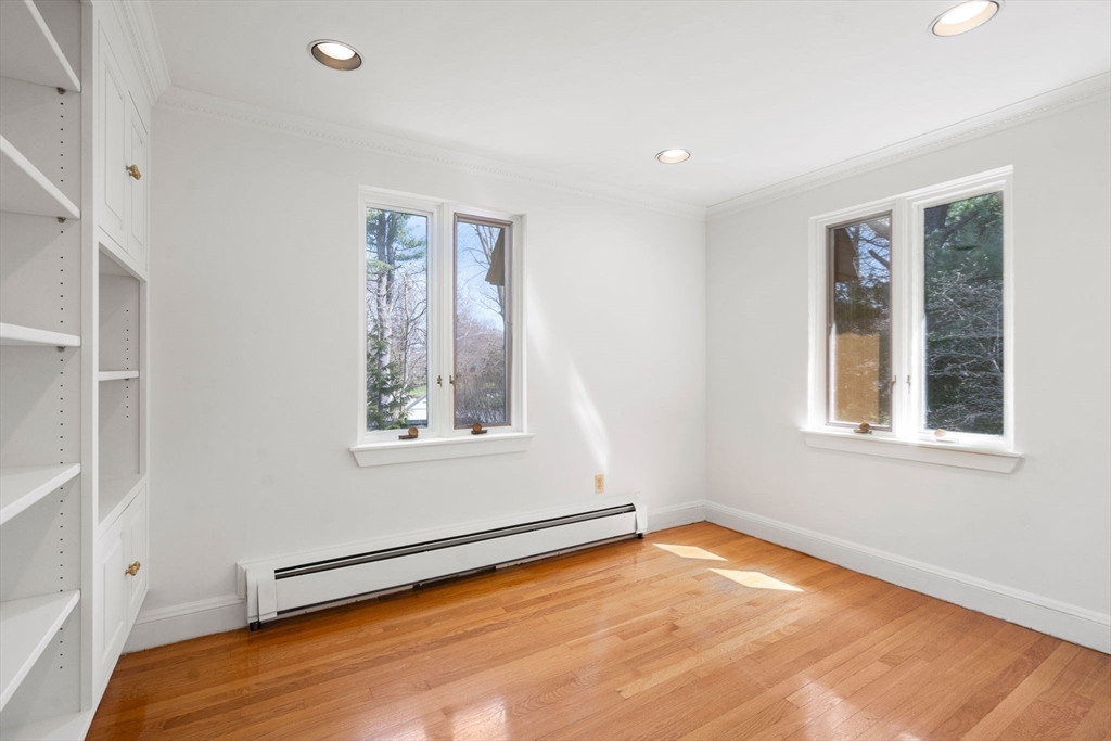 96 Monadnock Road Newton, MA 02467 - Photo 20 of 25 a view of an empty room with a window