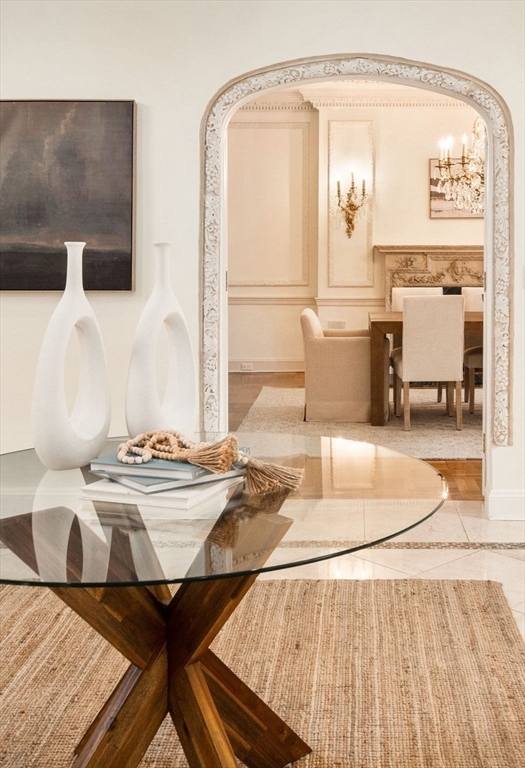 96 Monadnock Road Newton, MA 02467 - Photo 7 of 25 a living room with table and chairs