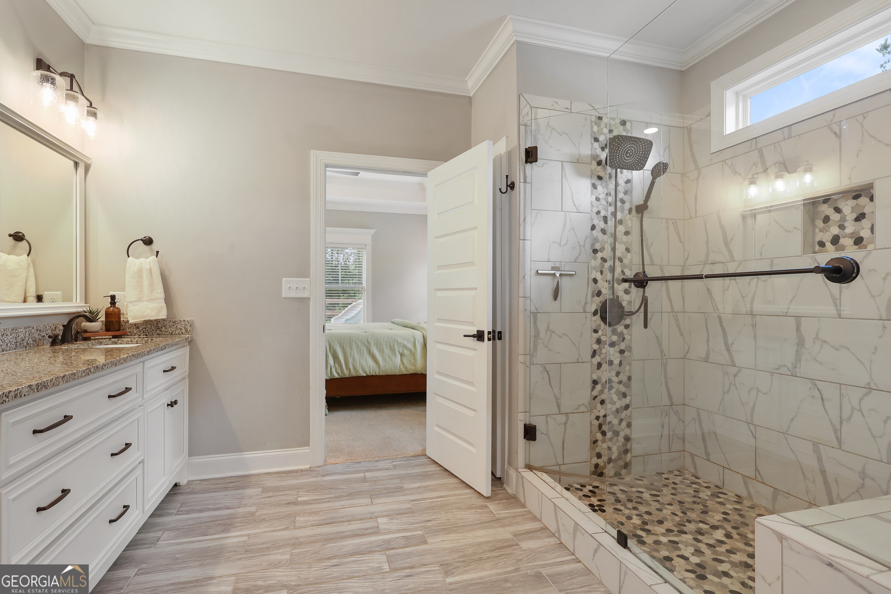 89 Claire Road Forsyth, GA 31029 - Photo 25 of 40 a en suite bathroom with a granite countertop shower