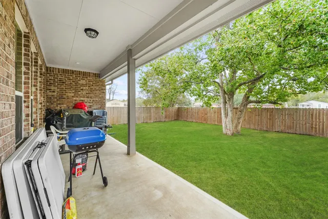 a living room with furniture and a gate