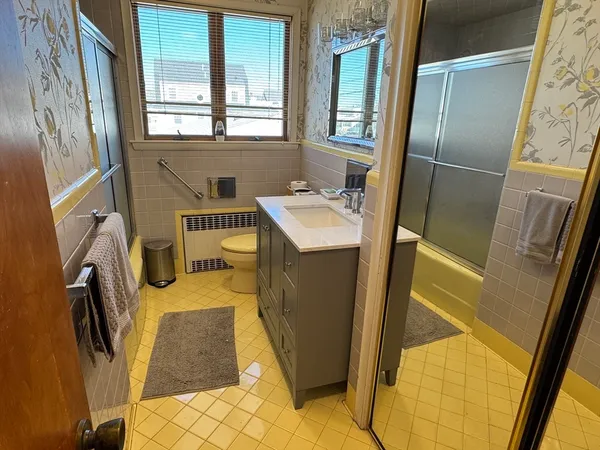 a utility room with a sink a washer and dryer