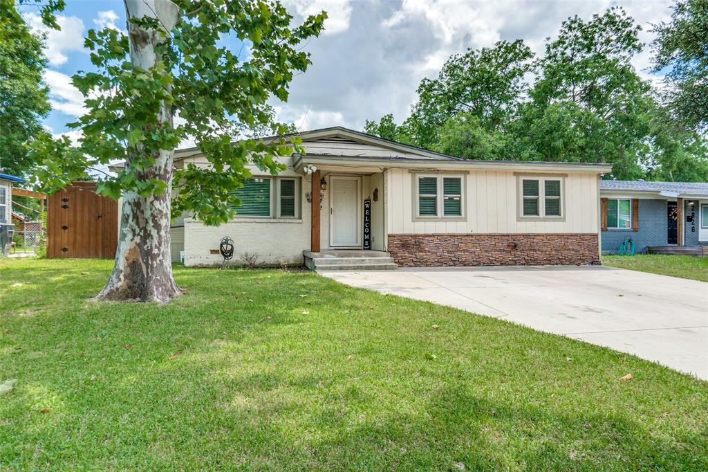 2902 Hillglenn Road Dallas, TX 75228 - Photo 1 of 1 View of front facade featuring a front lawn and crawl space
