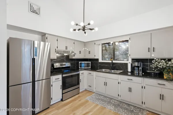 $295,000 | 2398 Woodcrest Drive, East Stroudsburg, PA 18302