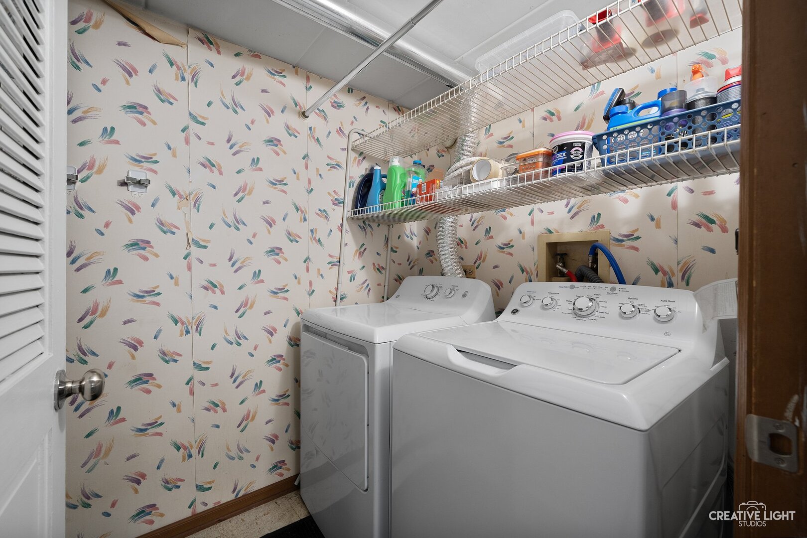 1258 Chalet Road, Unit 104 Naperville, IL 60563 - Photo 12 of 14 a utility room with dryer and washer