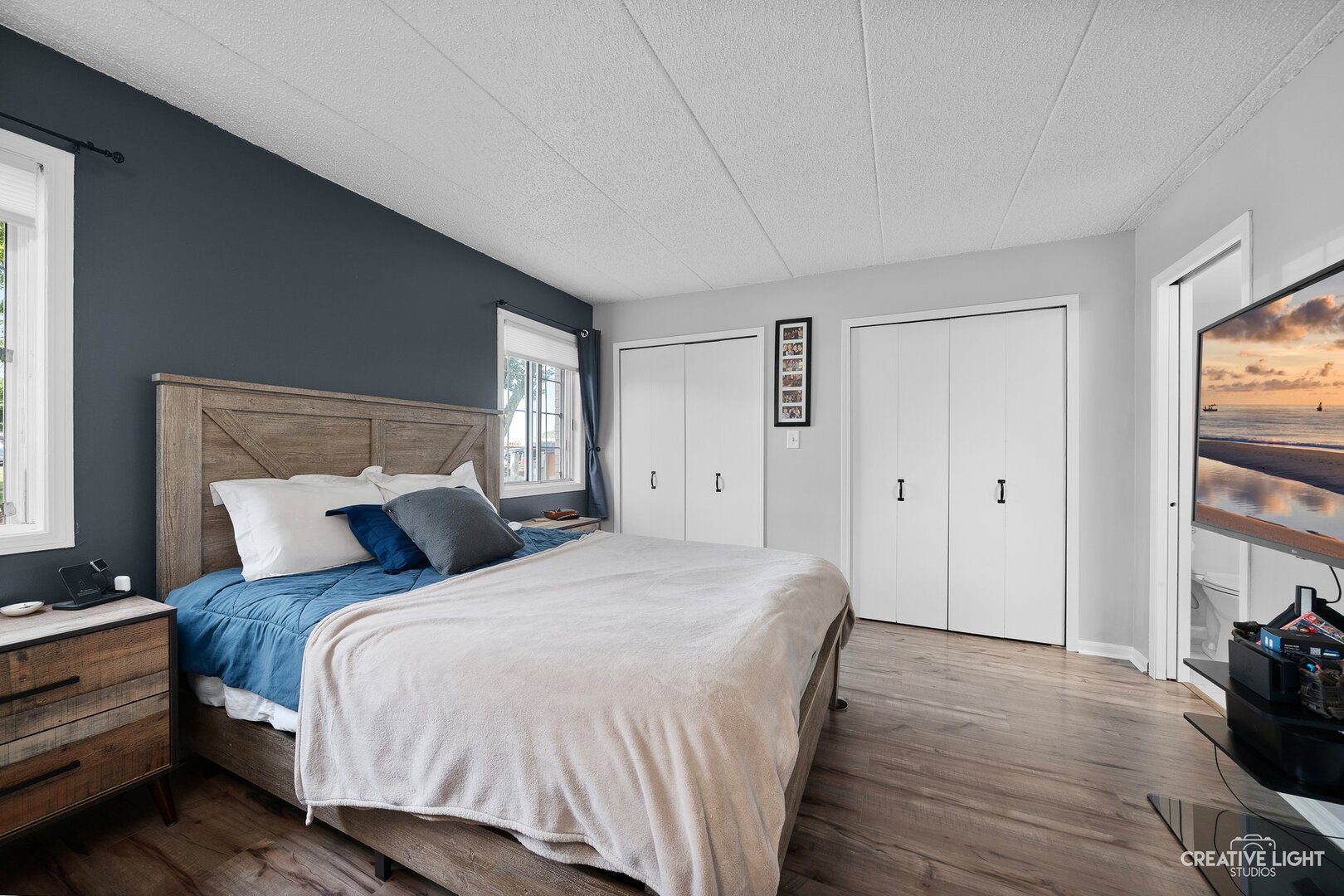1258 Chalet Road, Unit 104 Naperville, IL 60563 - Photo 8 of 14 a bedroom with a bed and a closet