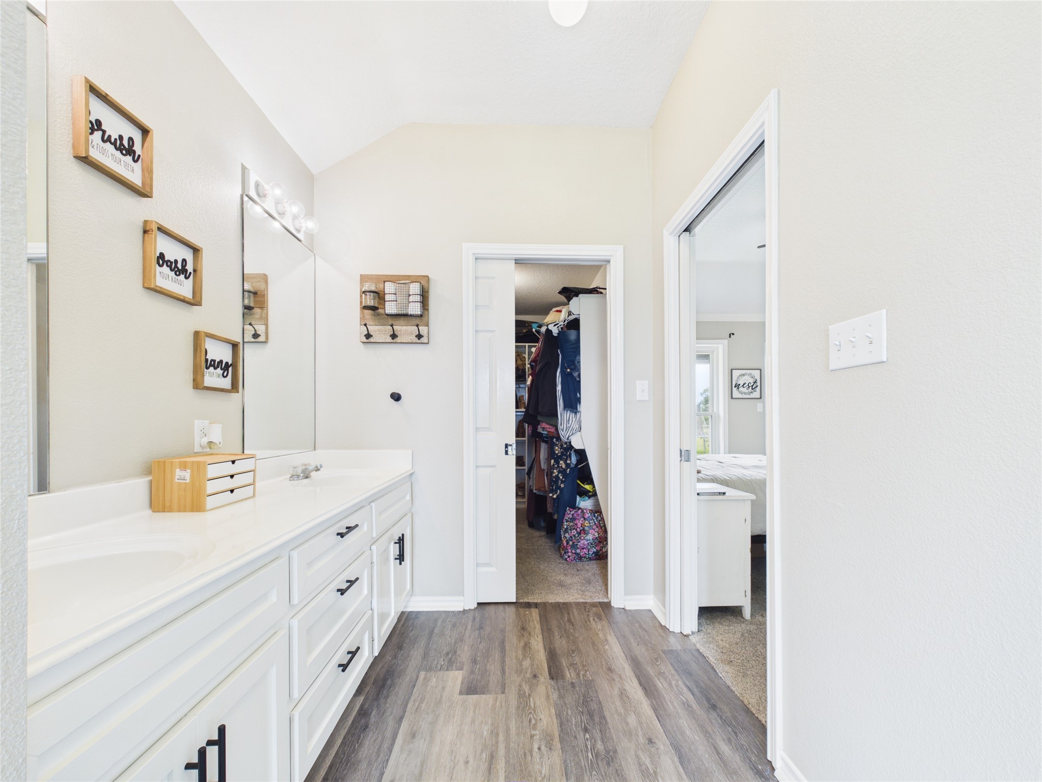 4610 Mustang Road Alvin, TX 77511 - Photo 35 of 50 Pocket door entry to the primary bathroom AND pocket door entry into the walk in closet. Charming and efficient use of space!