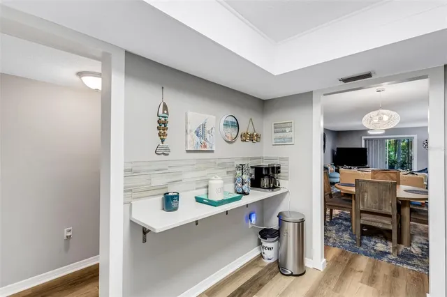 a view of kitchen and dining room with furniture