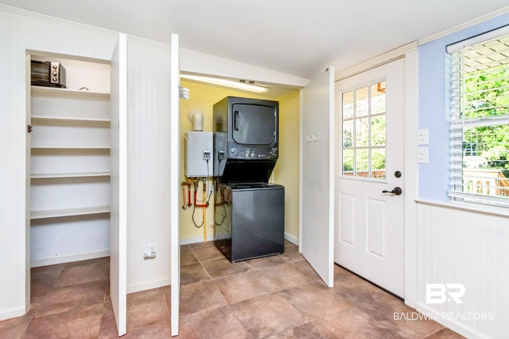 10 South Hathaway Road Mobile, AL 36608 - Photo 26 of 46 Laundry area with stacked washing machine and dryer