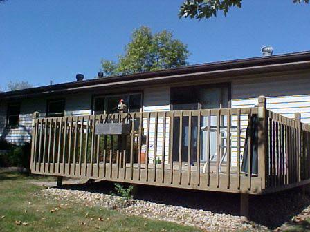 2461 Graham Road Belvidere, IL 61008 - Photo 5 of 6 a view of a back yard of a house with a garden