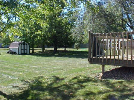 2461 Graham Road Belvidere, IL 61008 - Photo 6 of 6 a view of a bench in a park