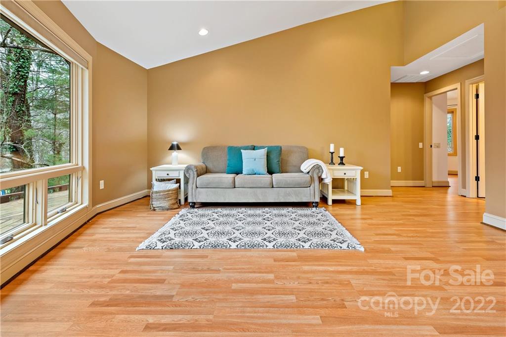 174 A Weston Road Arden, NC 28704 - Photo 20 of 31 a living room with furniture and a rug