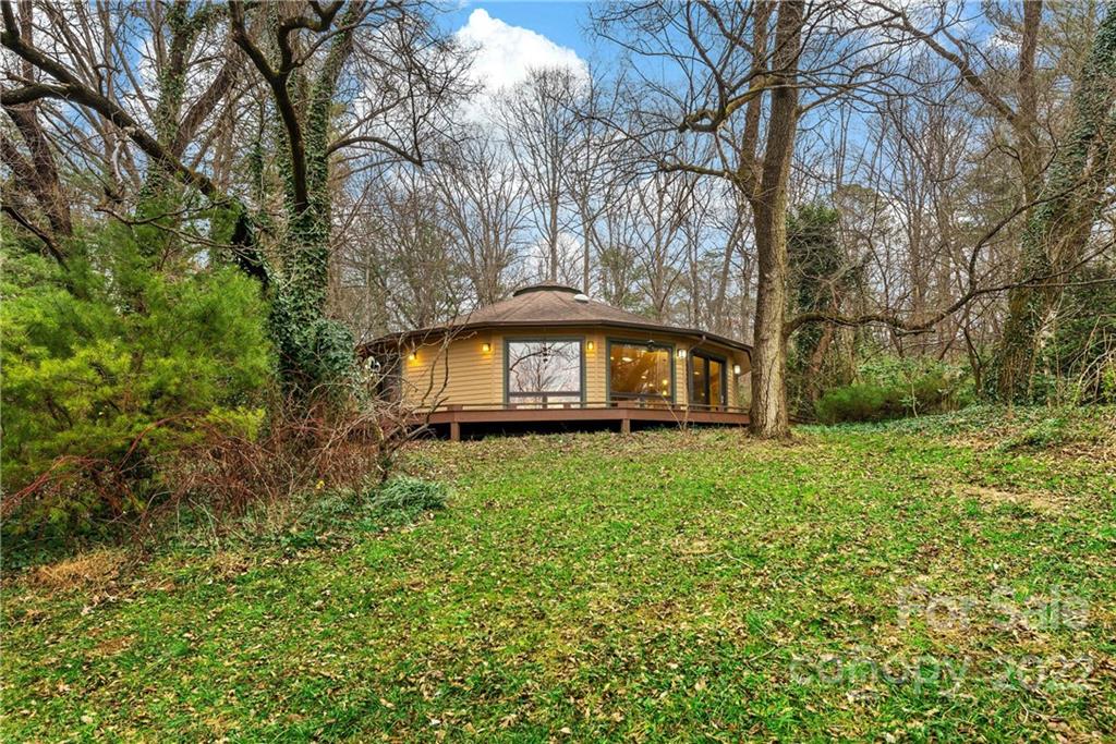 174 A Weston Road Arden, NC 28704 - Photo 4 of 31 a backyard of a house with lots of green space