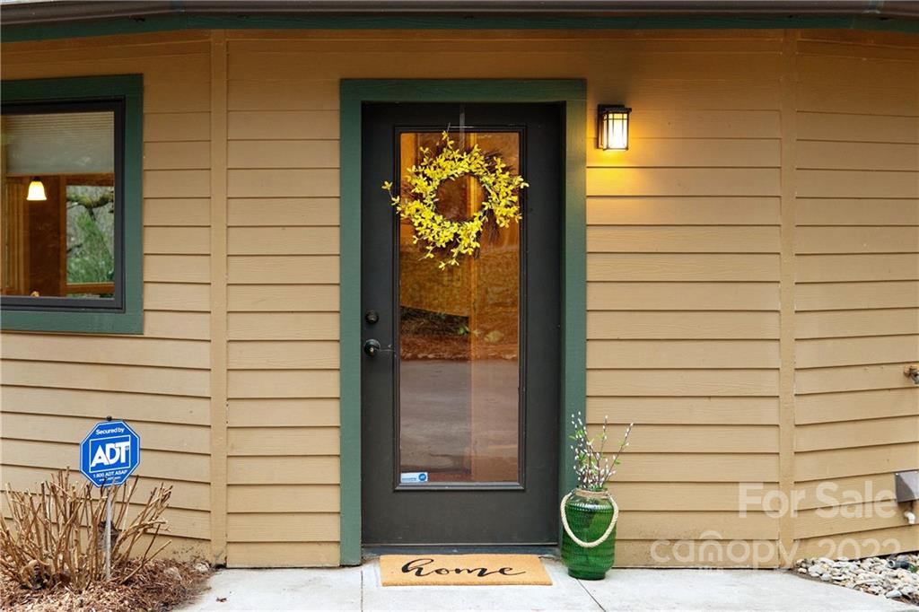 174 A Weston Road Arden, NC 28704 - Photo 8 of 31 a view of a door of the house