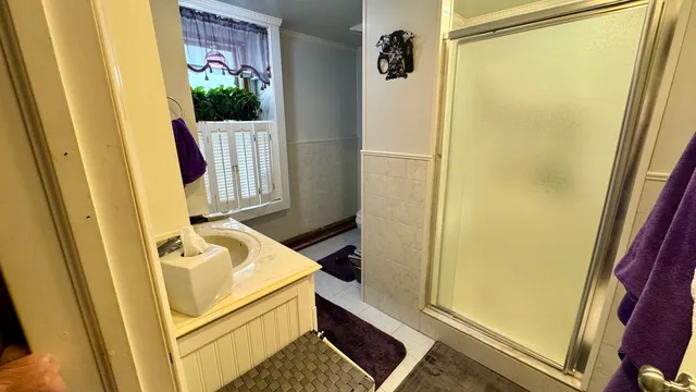 a bathroom with a sink and washing machine