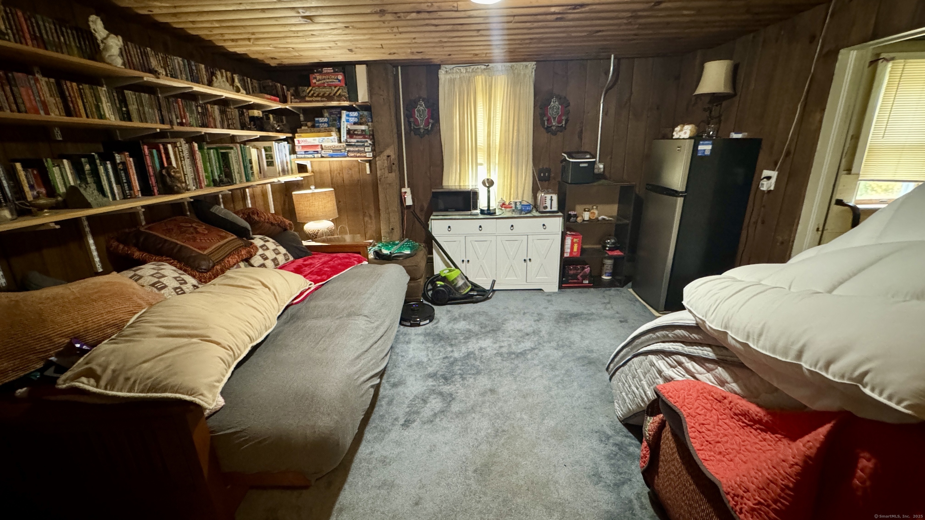 462 Norwich Road Plainfield, CT 06374 - Photo 7 of 23 a living room with lots of furniture and closet
