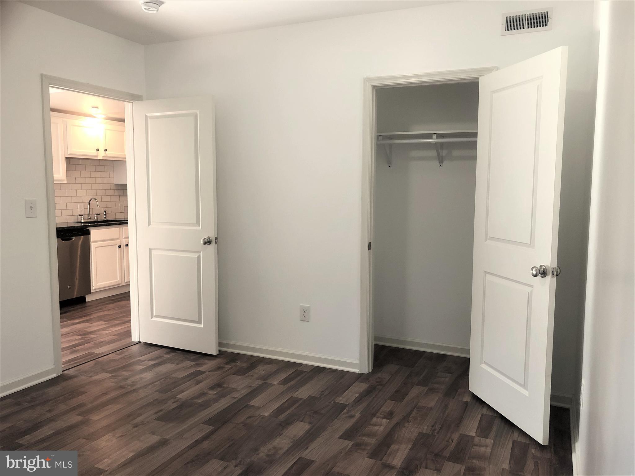 5261 Ridge Avenue, Unit 305 Philadelphia, PA 19128 - Photo 5 of 7 a view of a hardwood floor in a room