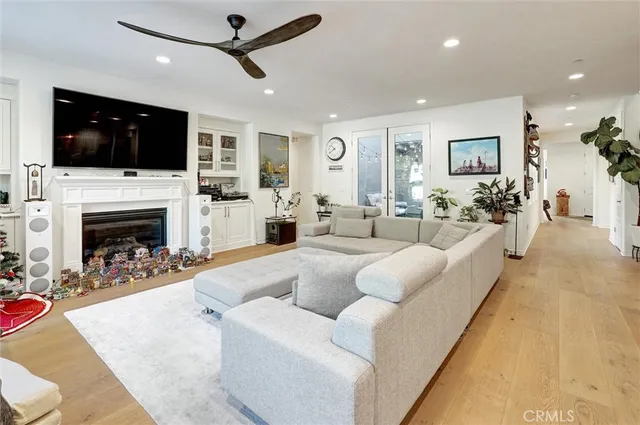 a bedroom with a bed and a cabinets