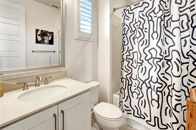 a view of a park with large trees