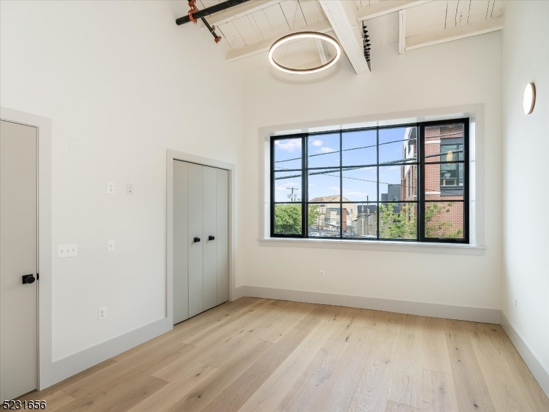 369 Bloomfield Avenue, Unit 2 Montclair, NJ 07042 - Photo 12 of 19 a view of an empty room with a window