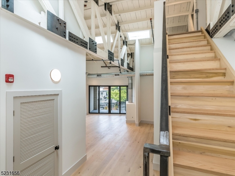 369 Bloomfield Avenue, Unit 2 Montclair, NJ 07042 - Photo 18 of 19 a view of entryway and hall with wooden floor