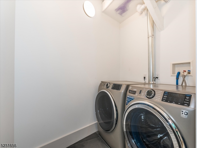 369 Bloomfield Avenue, Unit 2 Montclair, NJ 07042 - Photo 3 of 19 a utility room with dryer and washer