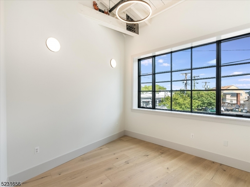 369 Bloomfield Avenue, Unit 2 Montclair, NJ 07042 - Photo 10 of 19 an empty room with a window