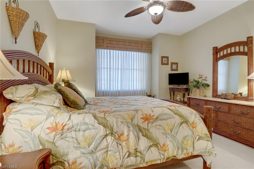 20531 Foxworth Circle Estero, FL 33928 - Photo 17 of 50 Carpeted bedroom with ceiling fan