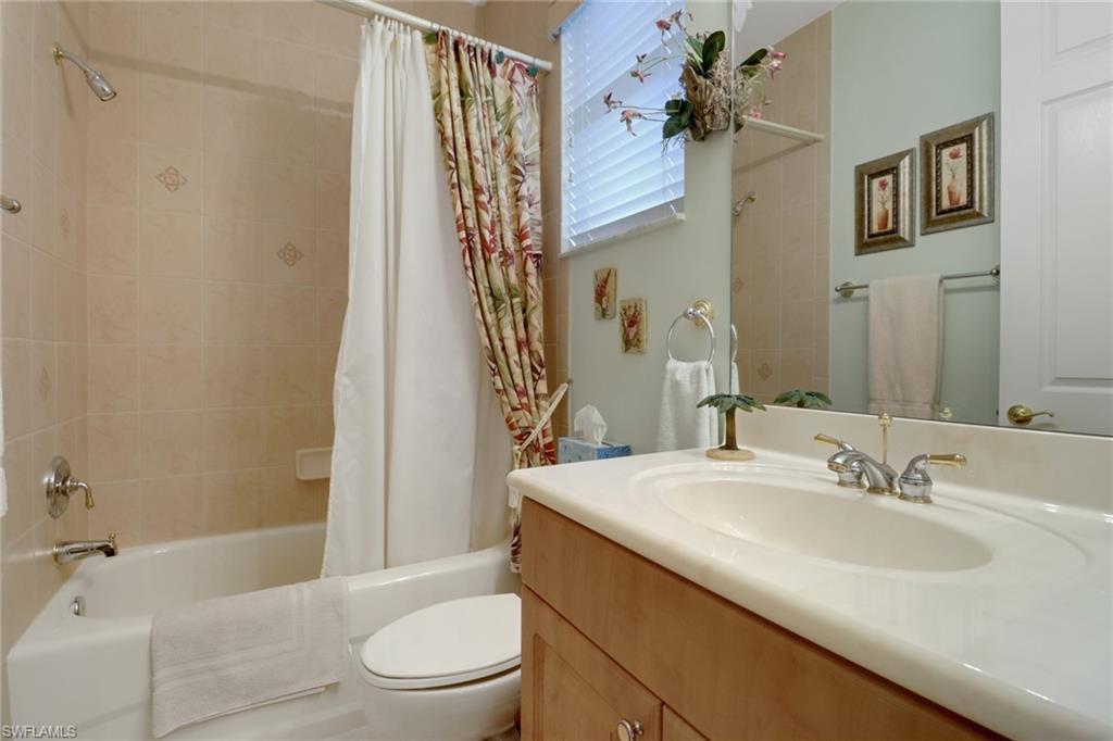 20531 Foxworth Circle Estero, FL 33928 - Photo 18 of 50 Full bathroom with vanity, shower / tub combo with curtain, and toilet
