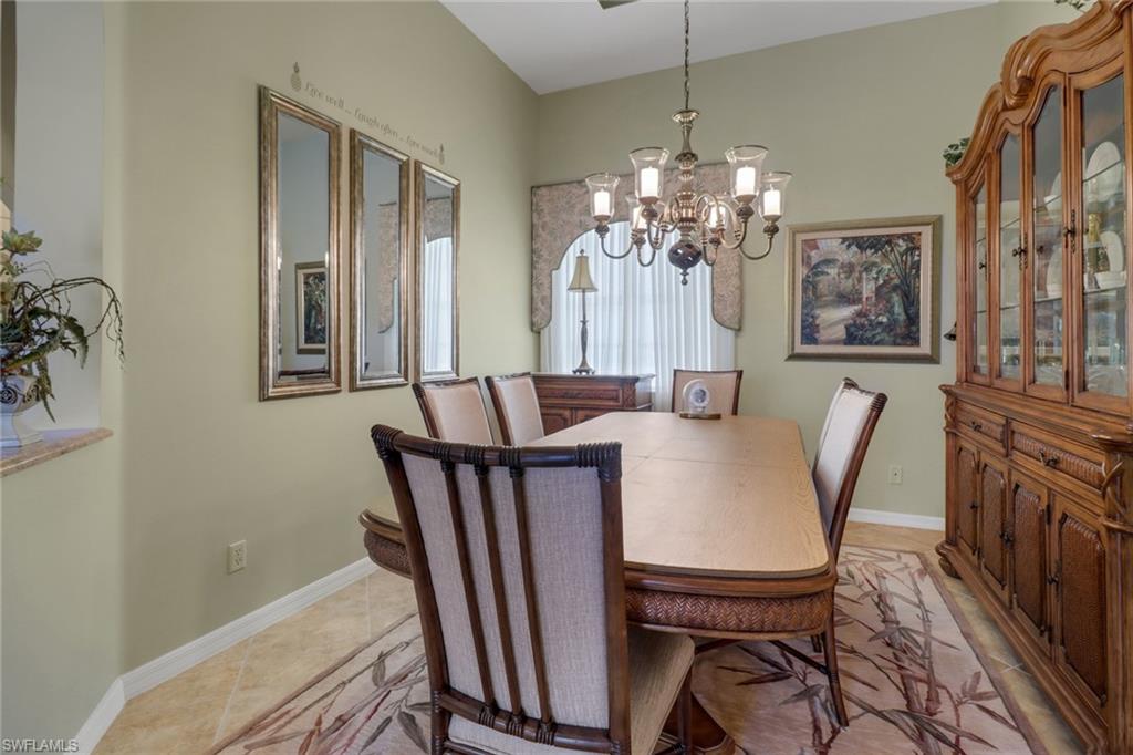 20531 Foxworth Circle Estero, FL 33928 - Photo 3 of 50 Tiled dining area featuring a chandelier