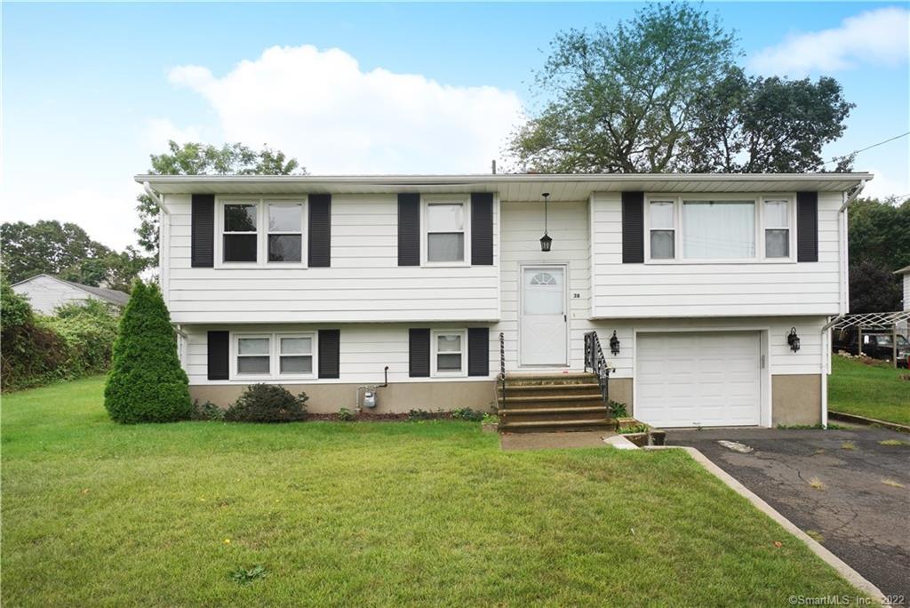 38 Edgemere Road East Haven, CT 06512 - Photo 1 of 1 a front view of a house with a garden