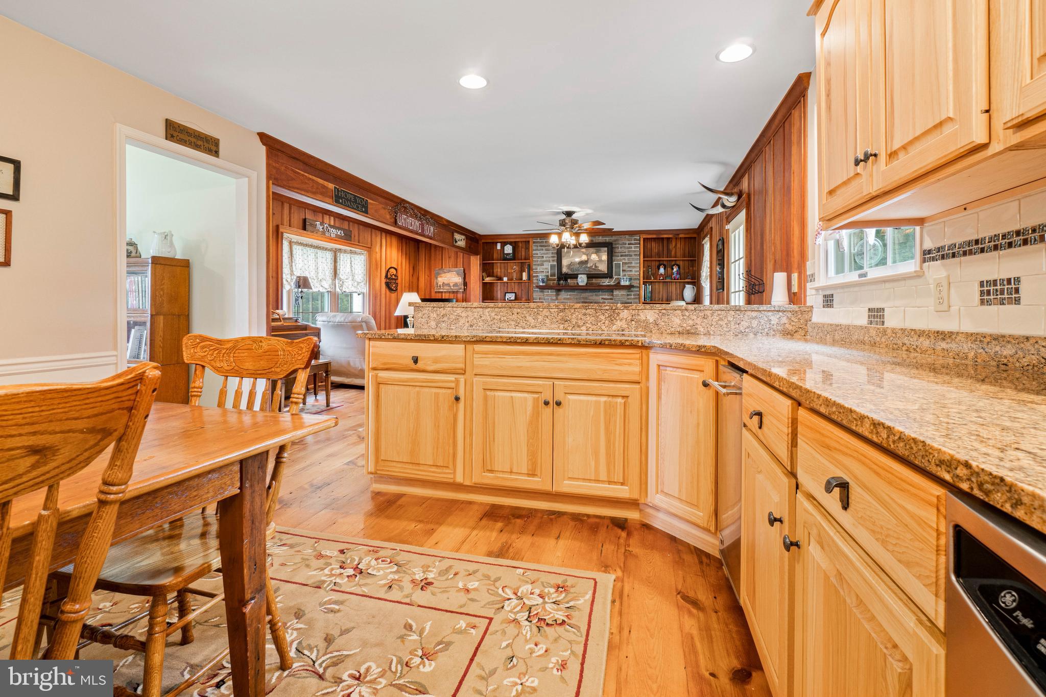 3911 Telegraph Road Elkton, MD 21921 - Photo 12 of 38 Granite countertops and reclaimed pine wood floors
