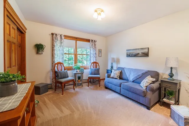 a view of living room and kitchen