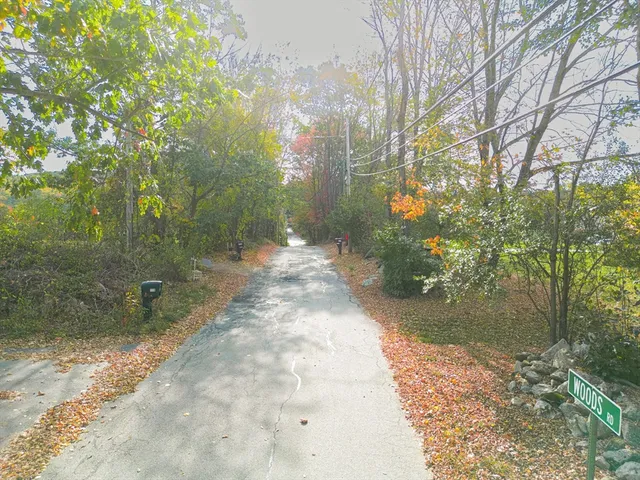 a view of large house with a yard