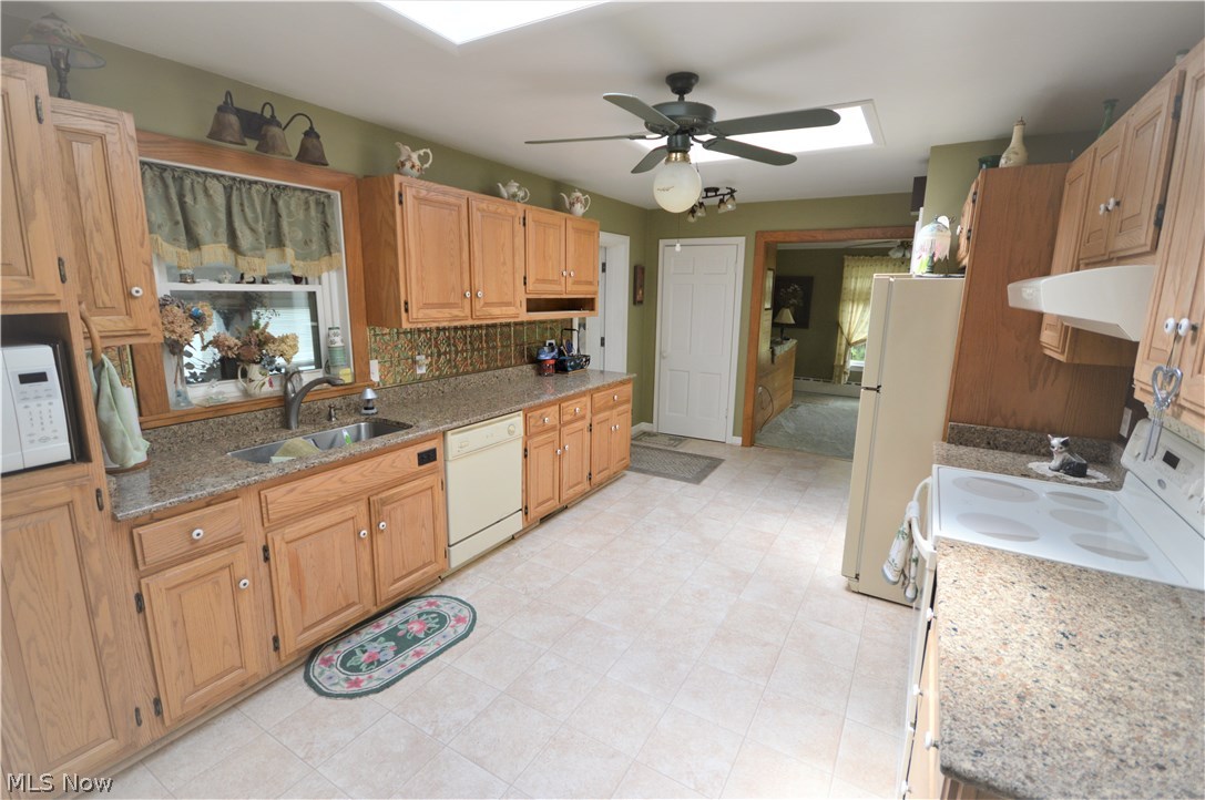 5618 Middle Ridge Road Madison, OH 44057 - Photo 8 of 18 You wont lack storage or space in the kitchen with an abundance of cupboards, and beautiful granite counters