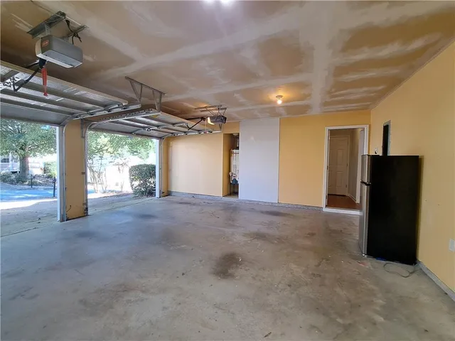 front view of a brick house with a outdoor space