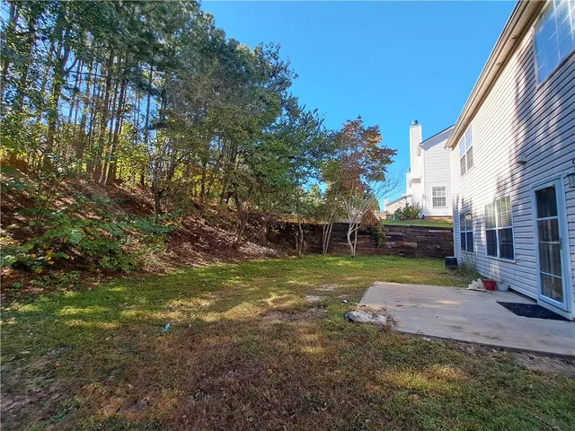 a picture of a bathroom with a shower