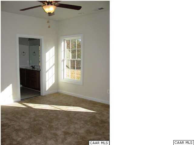 0 Timber Ridge, Unit 2 Gordonsville, VA 22942 - Photo 17 of 19 a view of an empty room with a window
