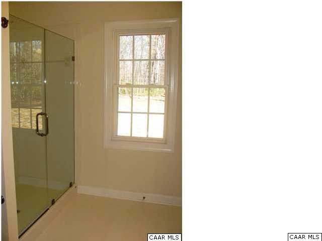 0 Timber Ridge, Unit 2 Gordonsville, VA 22942 - Photo 19 of 19 a bathroom with a shower and a sink