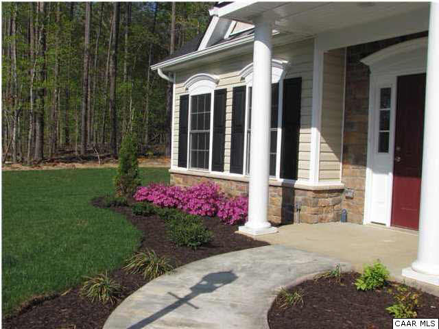 0 Timber Ridge, Unit 2 Gordonsville, VA 22942 - Photo 3 of 19 a view of a house with a yard and fountain