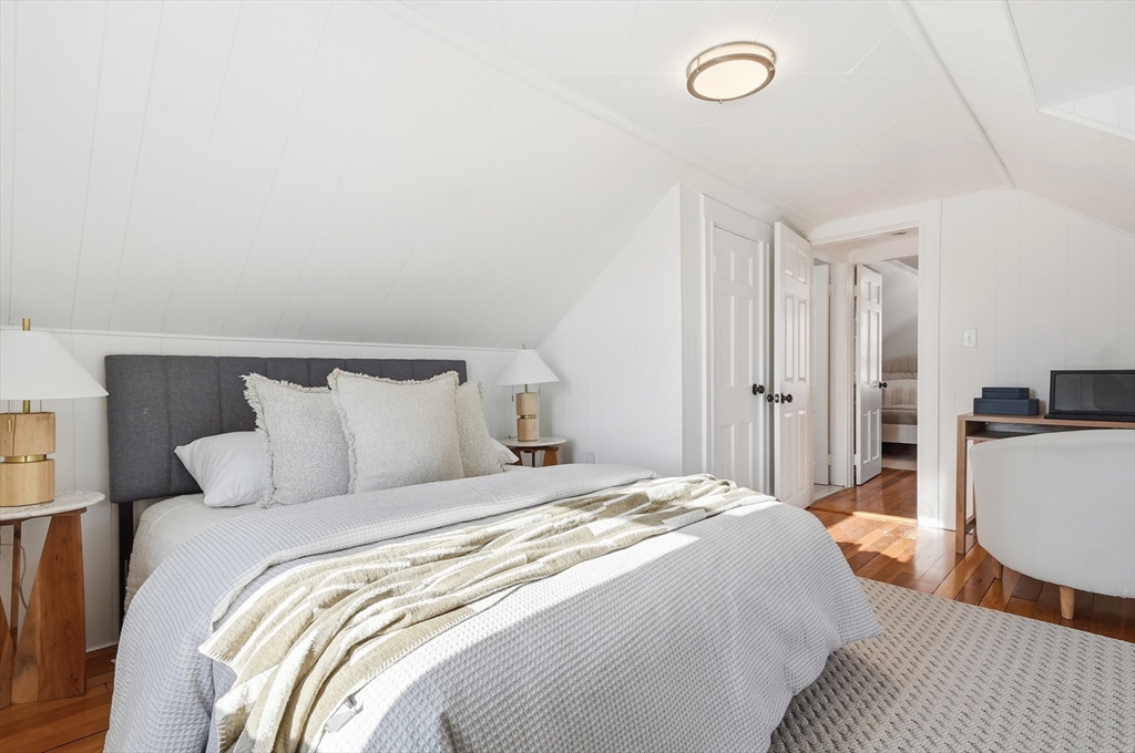 29 Puritan Road Watertown, MA 02472 - Photo 17 of 33 a bedroom with a bed and a couch