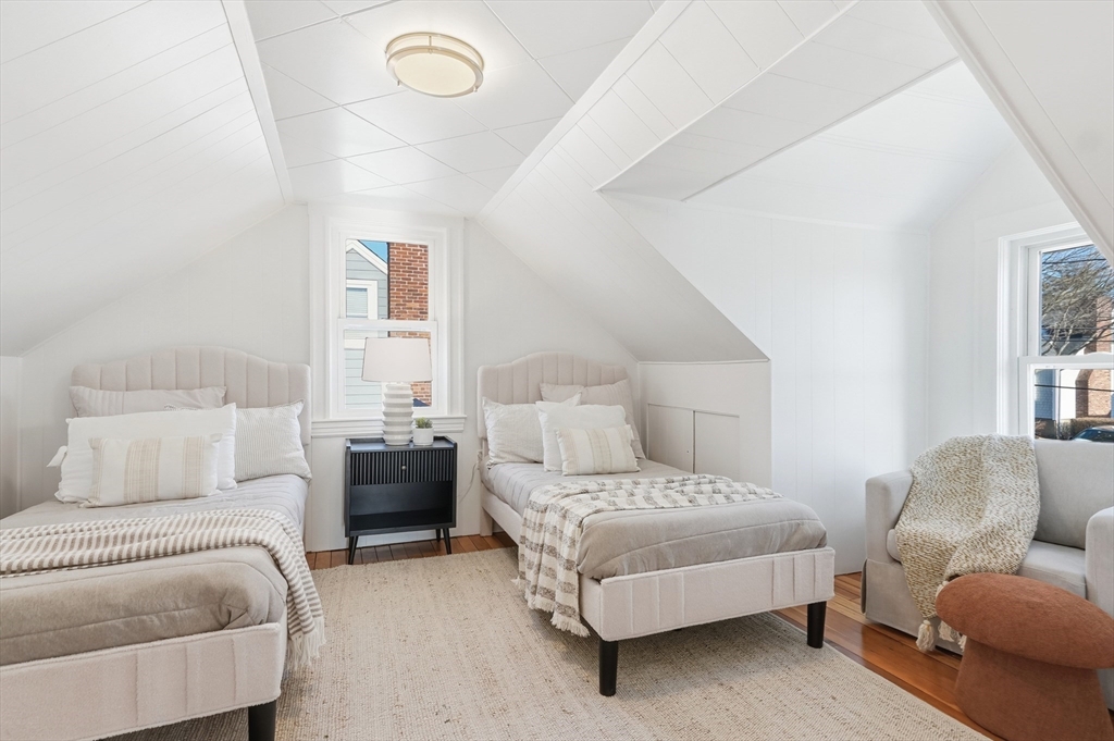 29 Puritan Road Watertown, MA 02472 - Photo 18 of 33 a bedroom with a bed and a couch