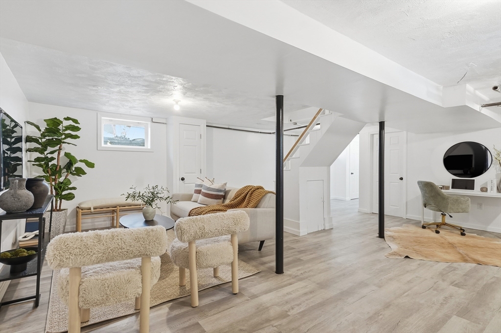 29 Puritan Road Watertown, MA 02472 - Photo 21 of 33 a living room with furniture