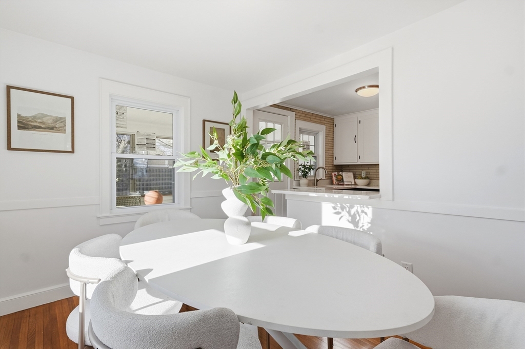 29 Puritan Road Watertown, MA 02472 - Photo 6 of 33 a dining room with furniture and wooden floor