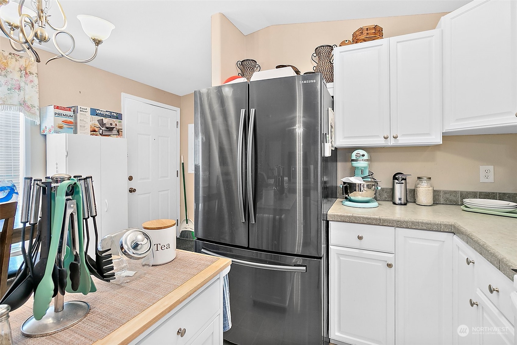 2101 South 324th Street, Unit 32 Federal Way, WA 98003 - Photo 11 of 30 a kitchen with appliances and cabinets