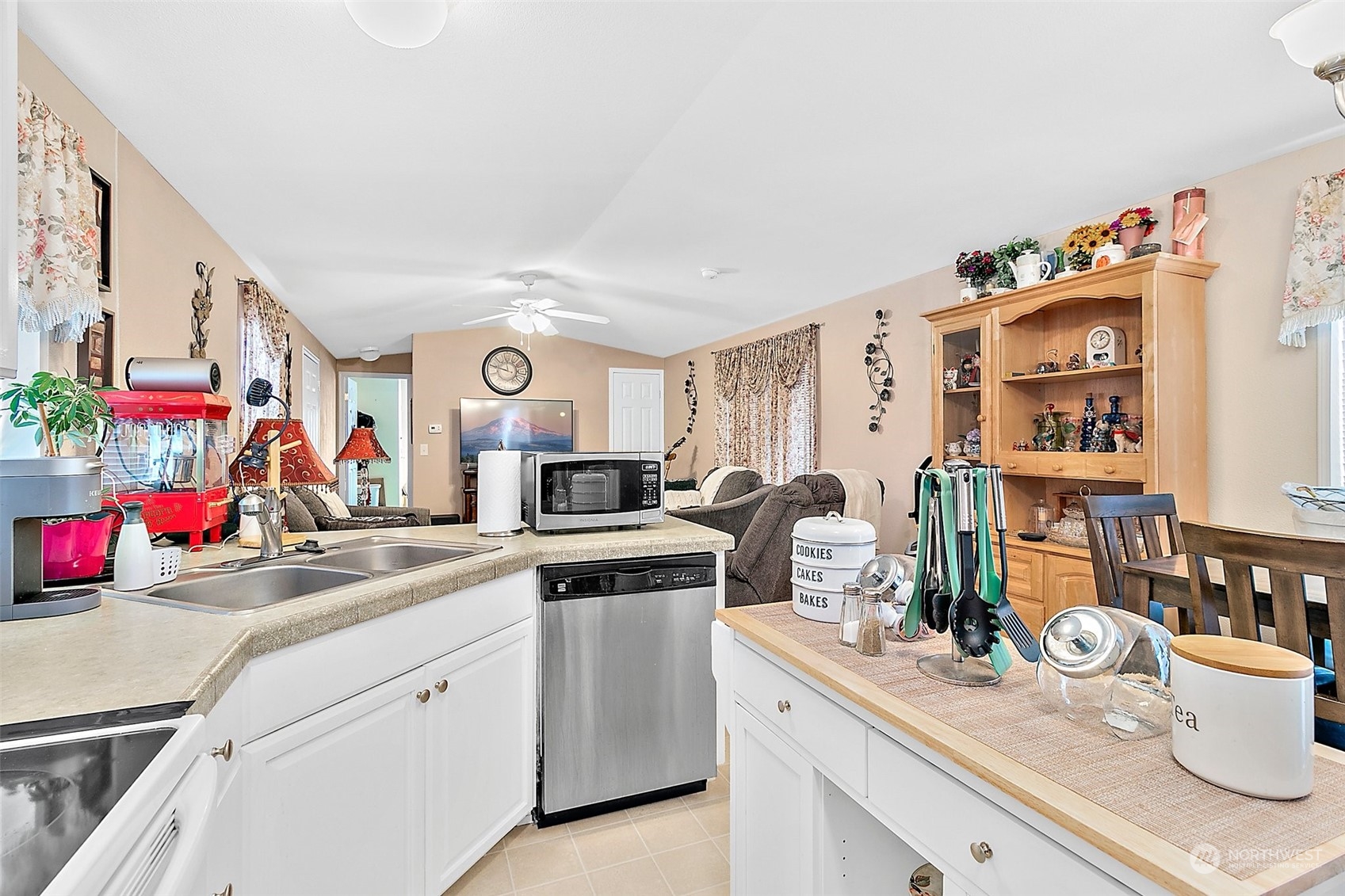 2101 South 324th Street, Unit 32 Federal Way, WA 98003 - Photo 12 of 30 a kitchen with a sink and cabinets