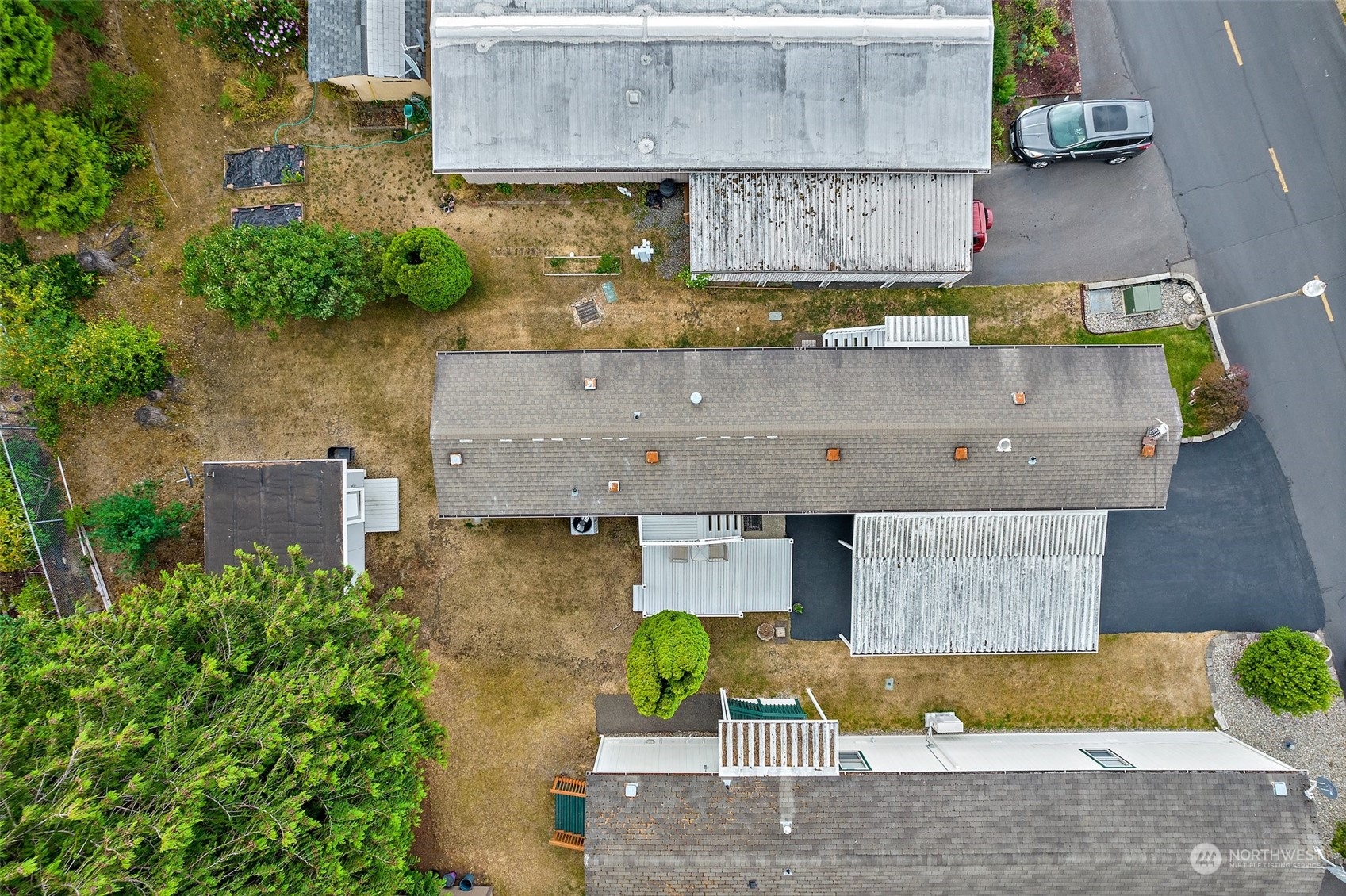 2101 South 324th Street, Unit 32 Federal Way, WA 98003 - Photo 25 of 30 an aerial view of residential houses with outdoor space