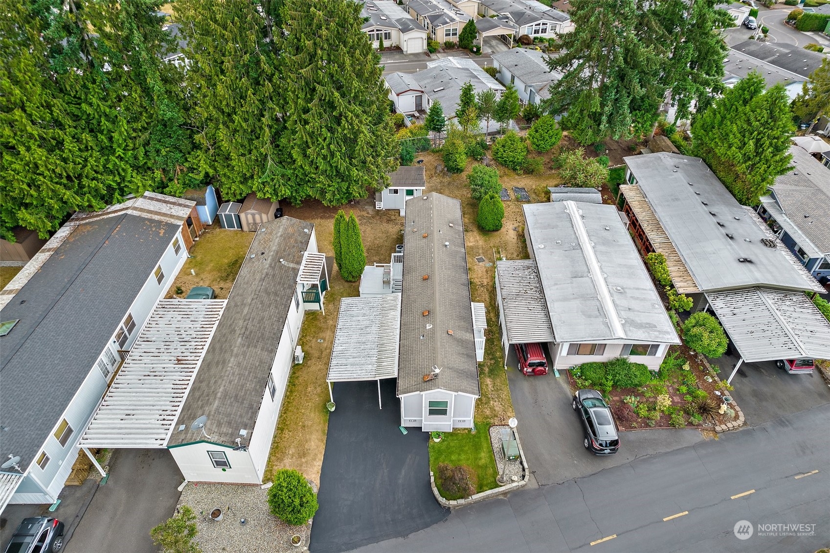 2101 South 324th Street, Unit 32 Federal Way, WA 98003 - Photo 26 of 30 an aerial view of residential house with outdoor space and trees